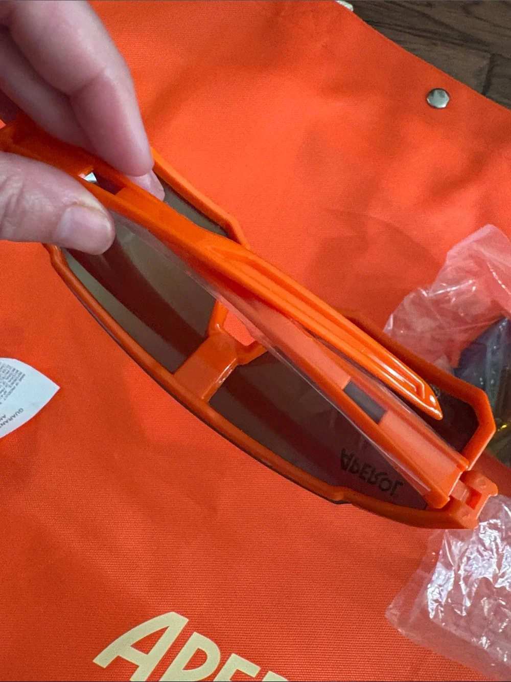 Aperol Beach Kit Orange Tote Bag, two sunglasses 🕶️, chapstick